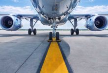 shutterstock 637037008 underside of jet aircraft and jet turbines on runway