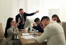 business meeting men women office unhappy frustrated angry